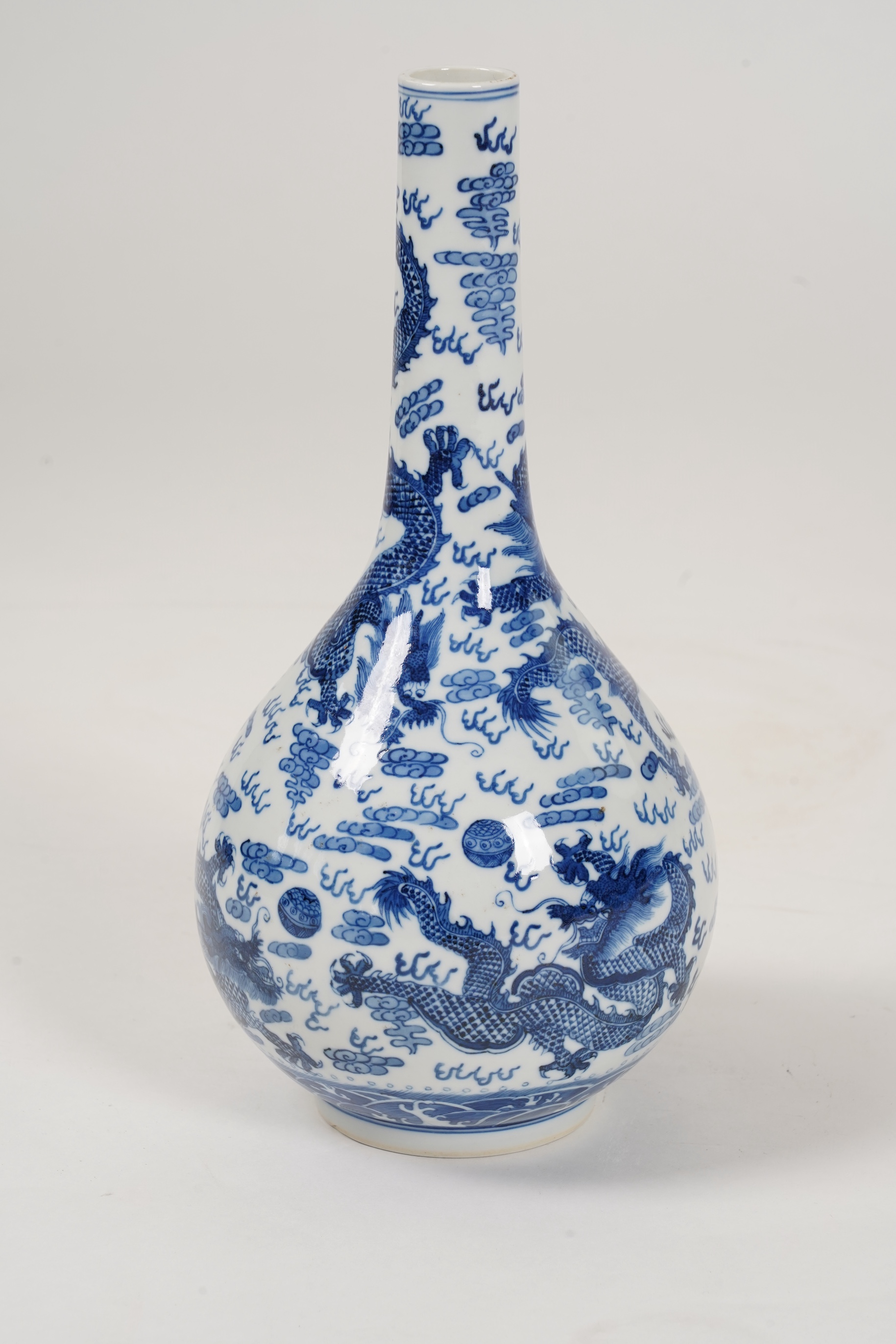 A Chinese blue and white 'dragon' bottle vase, 19th/20th century